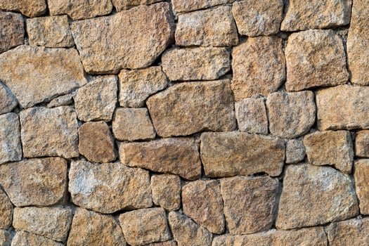 Stone wall. Outdoor background natural stone. photo