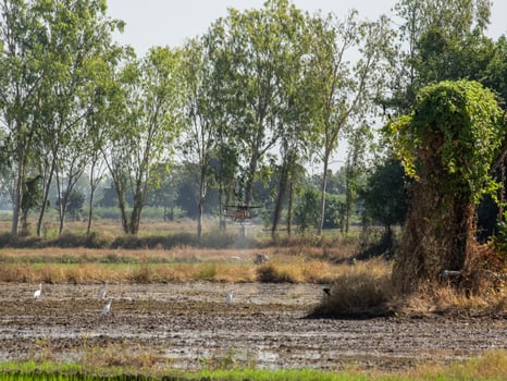 The drone can be controlled by mobile phone using GPS signals to control the direction of agricultural movement. photo