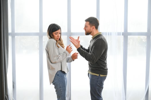 Drunk and aggressive boyfriend yelling at his girlfriend photo