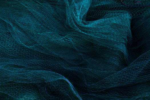 Blue nets background in the dark. photo
