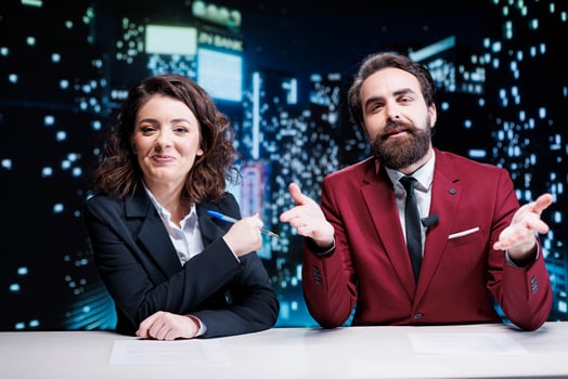 Newscasters team debating live topics on tv channel, broadcasting night show worldwide and discussing about latest news or interesting events. Man and woman colleagues working in media industry. photo