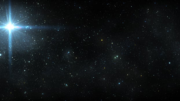Night sky with stars sparkling on black background photo