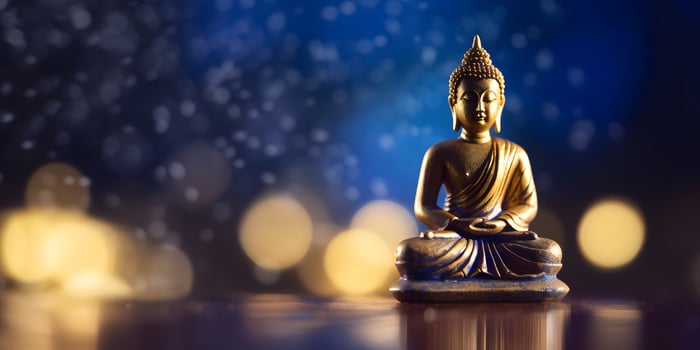 AI generated Buddha in a lotus position small statue in dark religious thoughtful environment with bokeh, neural network generated image photo