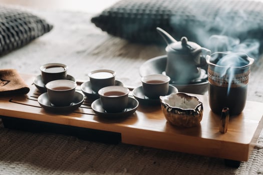 Tea ceremony with smoking incense. Incense stick and tea ceremony photo