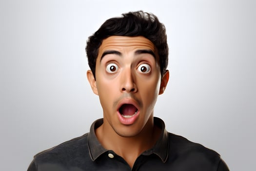 AI generated Surprised young adult Latin American man on grey background. Neural network generated photorealistic image. photo