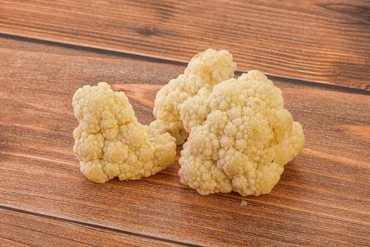 Raw white cauliflower cabbage heap photo