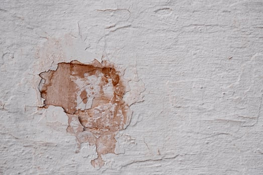 Exterior Concrete white wall texture with Peeling and Crack Brown Paint,Broken rough cement surface, Grey building wall with cracking plaster photo