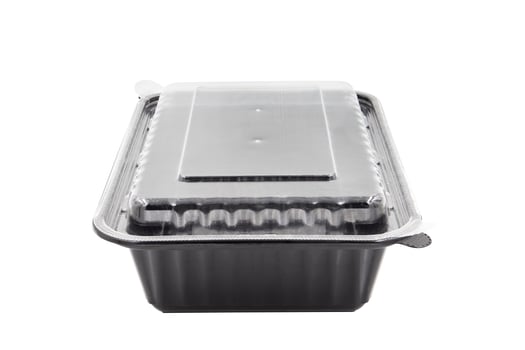 Plastic Food Packaging Tray With Clear Plastic Cover isolated on white background photo
