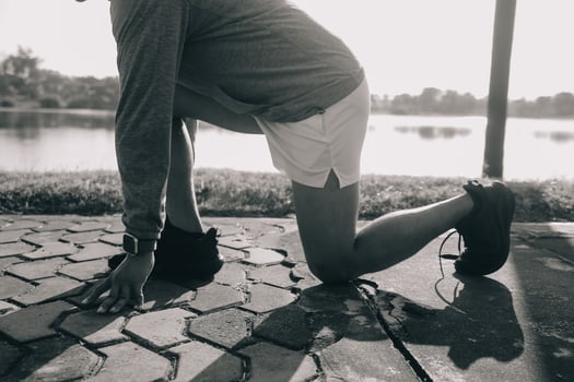 Athlete runner feet running on road,Jogging concept at outdoors. Man running for exercise.Athlete runner feet running on road, Jogging concept at outdoors. Man running for exercise. photo