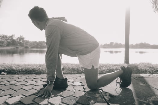 Athlete runner feet running on road,Jogging concept at outdoors. Man running for exercise.Athlete runner feet running on road, Jogging concept at outdoors. Man running for exercise. photo