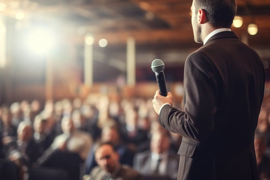 AI generated Speaker Giving a Talk at Business Conference. Audience at the conference hall. Business and Entrepreneurship. photo