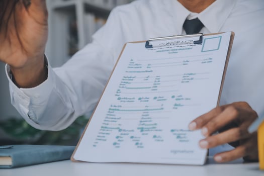 Real estate agent and customer signing contract to buy house, insurance or loan real estate.rent a house,get insurance or loan real estate or property. photo