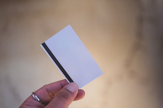 Man holding a movie tickets from seller at box office photo