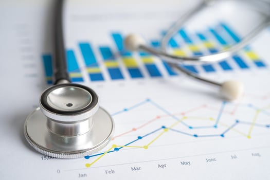 Stethoscope on graph paper, Finance, Account, Statistics, Investment, Analytic research data economy and Business company concept. photo