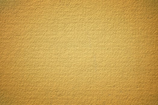Yellow Painting on Stucco Wall Background. photo
