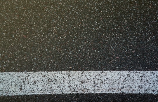 Surface grunge rough of asphalt. Tarmac dark grey grainy road. Texture Background Top view photo