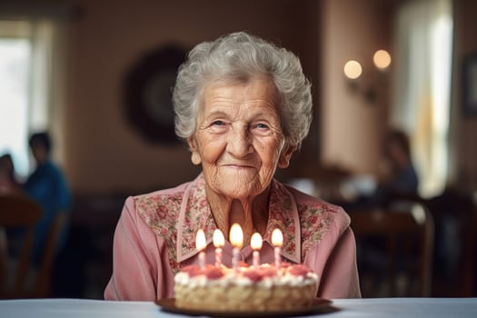 AI generated an elderly woman blows out the candles on a birthday cake at her home photo