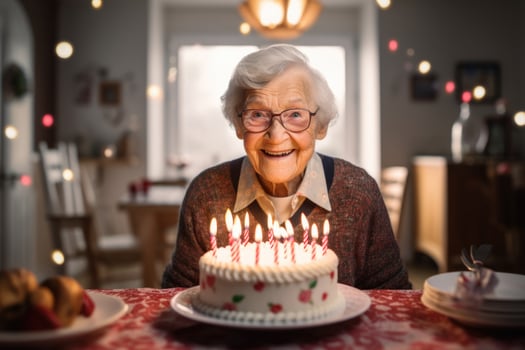 AI generated an elderly woman blows out the candles on a birthday cake at her home photo