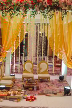 Haldi Decoration Wedding Hall Decorations of Sofa And Flowers photo