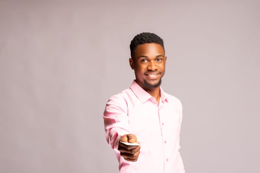 cute businessman giving out his business card photo
