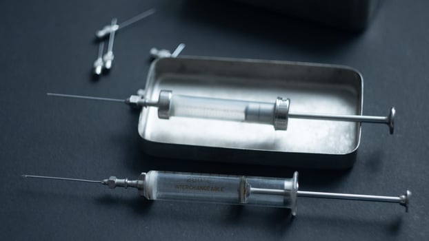 Vintage Glass Syringe, Nostalgic Medical Relic isolated photo
