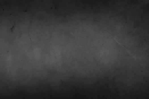 Dark grey black textured concrete background photo