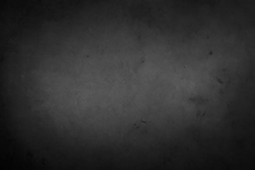 Dark grey black textured concrete background photo