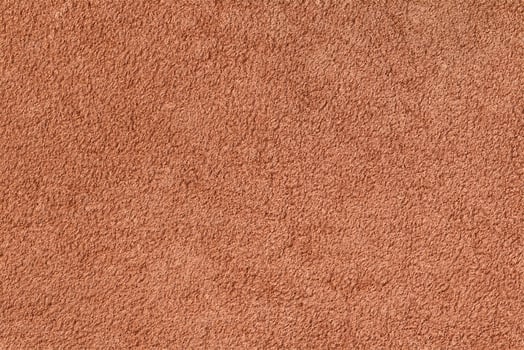 Smooth seamless texture of a terry towel. Sand color photo