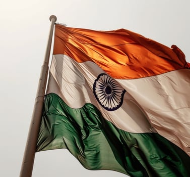 AI generated the wind flutters an indian flag in front of a white background photo