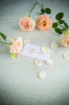 bouquet of beautiful orange roses on table photo
