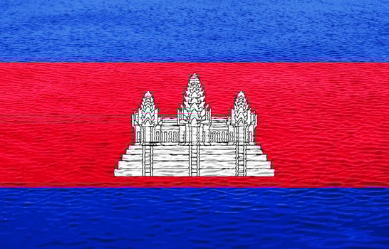 Flag of Kingdom of Cambodia on a textured background. Concept collage. photo