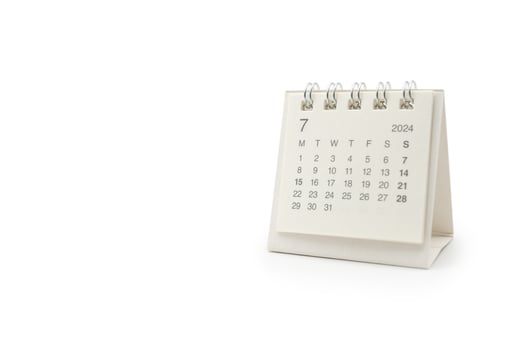 Simple desk calendar for July 2024 isolated on white background. Calendar concept with copy space. Clipping Path. photo