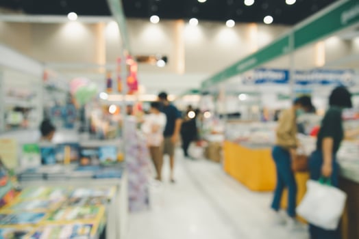 Abstract blur shopping mall of People who walk past each other to shop in the mall. photo