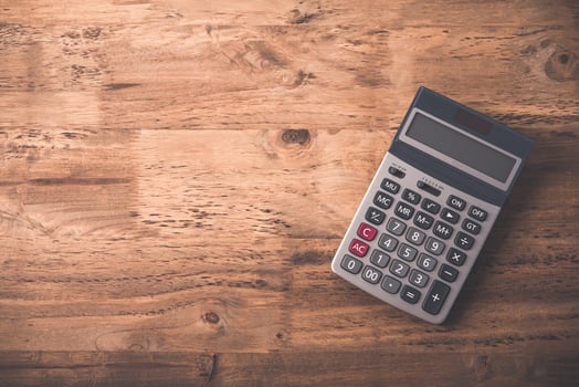 calculator placed on the desk photo