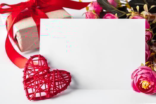 Greeting card for Valentine's day on a background of flowers. photo