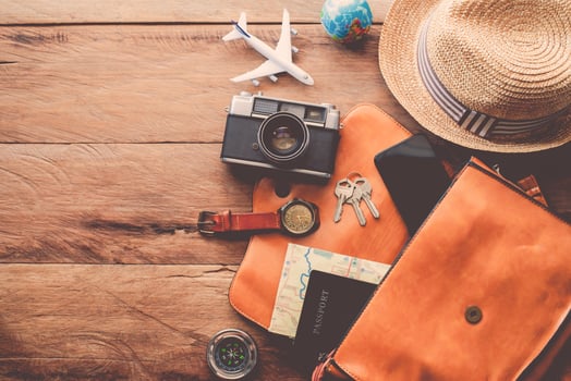 Travel accessories costumes. Passports, luggage, The cost of travel maps prepared for the trip photo