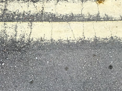 This textured surface showcases the raw beauty of concrete in an artistic manner. photo