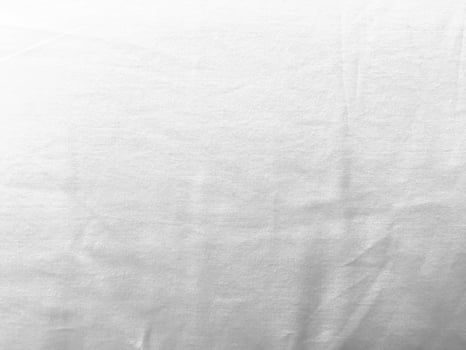 The luxurious silk material creates a gentle and smooth surface, offering an ideal setting for designers to showcase their creativity and craftsmanship. photo