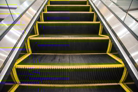 Electric escalator Way up the mall. photo
