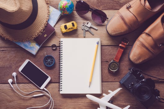 Travel accessories costumes. Passports, luggage, The cost of travel maps prepared for the trip photo