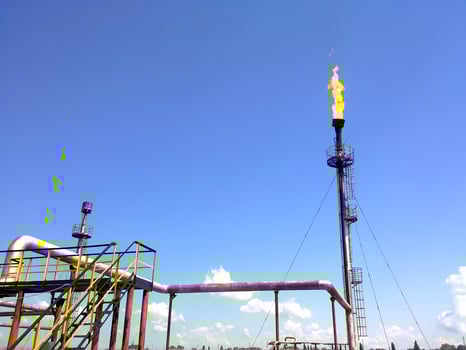 Flare for flaring associated gas. The end point of the pressure relief system on the oil facility. photo