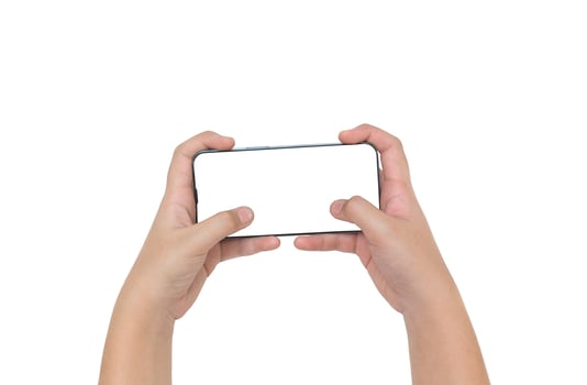 Female hands holding modern moblie phone in horizontal position, isolated on white photo