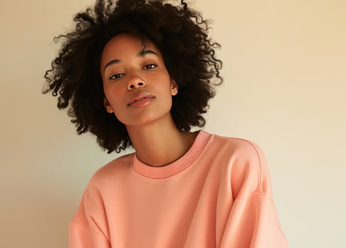 AI generated image of woman wearing a pink sweatshirt photo