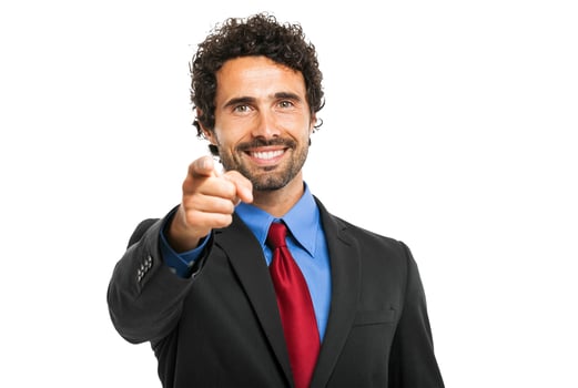 Businessman pointing his finger at you photo