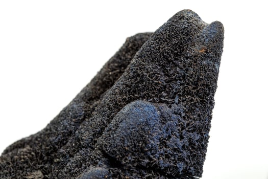 Macro stone mineral vivianite on a white background photo