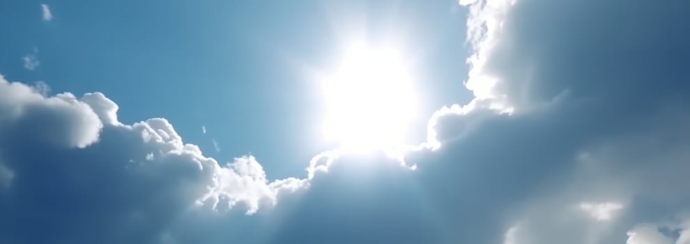 AI generated Blue sky background with white fluffy clouds photo