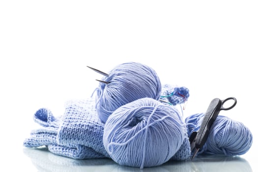 Set for hand knitting, blue yarn, knitting needles. photo