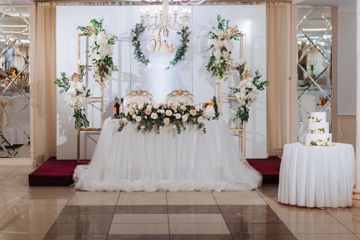 Presidium of the bride and groom at the wedding. Everything is almost ready for the wedding celebration. Wedding banquet photo