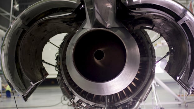Engine of the airplane under heavy maintenance. Aircraft maintenance, dismantled plane engine. Chassis of the airplane under heavy maintenance photo