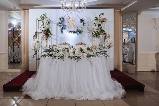Presidium of the bride and groom at the wedding. Everything is almost ready for the wedding celebration. Wedding banquet photo